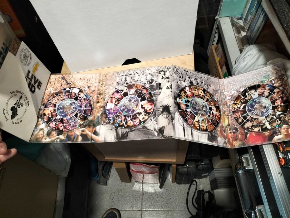 Live Aid - 4 DVDs em muito bom estado Dvds como novos
