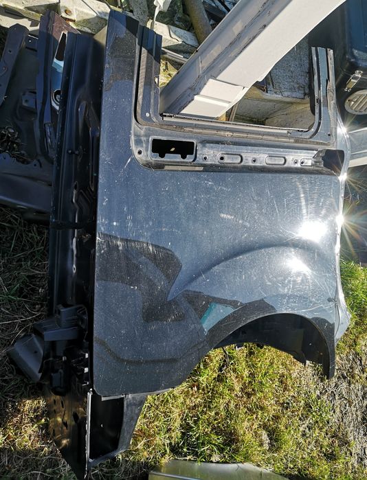 Berlingo 2 ćwiartka prawa tylna 08> Partner BŁOTNIK PRAWY TYLNY EXYB