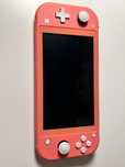 Nintendo switch lite coral + gra animal crossing oraz pokrowiec