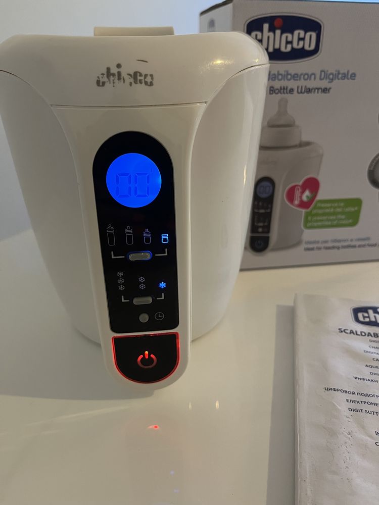 Aquecedor de biberões digital com temporizador da Chicco. Ofereço os portes de envio.