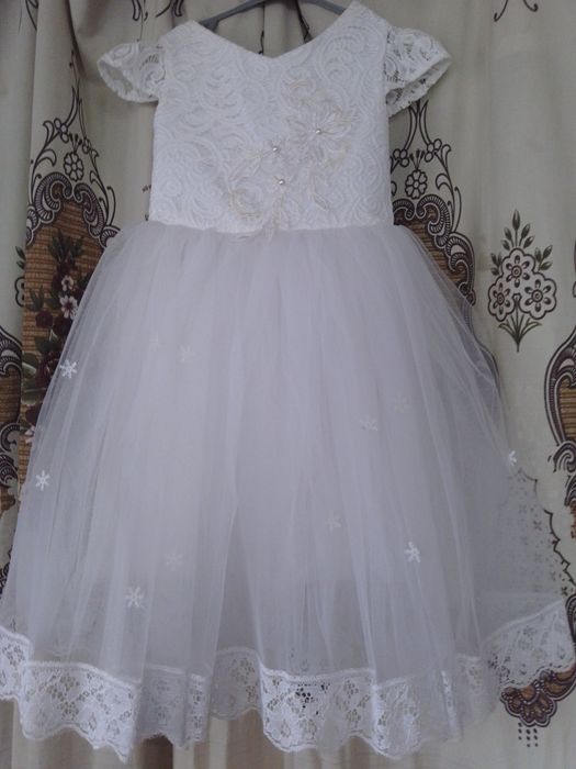 Святкові плаття на дівчинку від  3 до 7