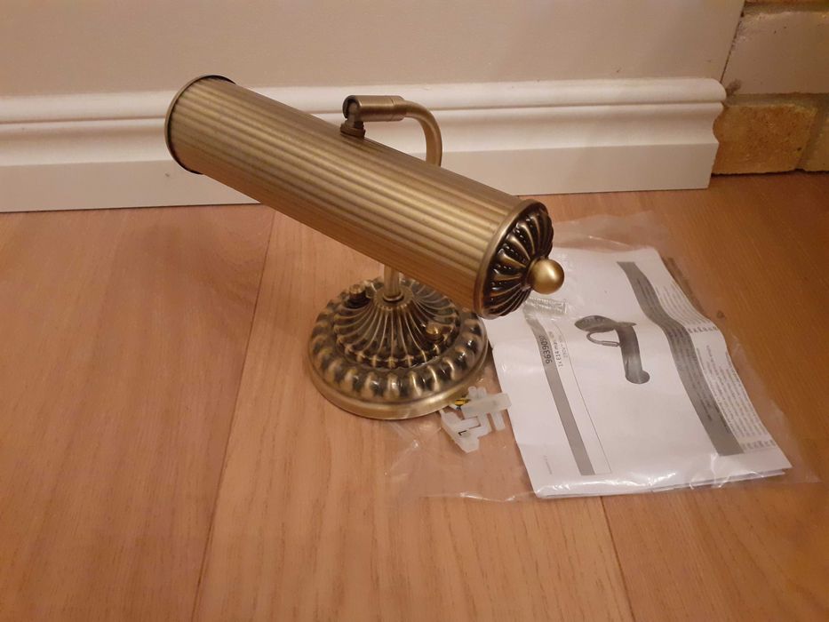 Kinkiet ścienny Lindby, nad obraz, mosiądz