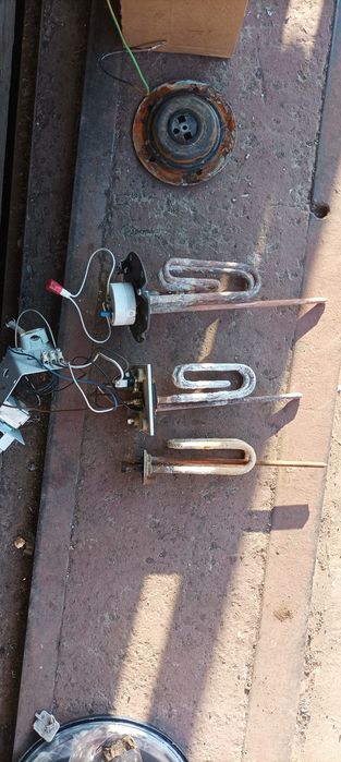 Electrolux Zanussi Aeg тен, замок люка, пресостат реле рівня води, тер