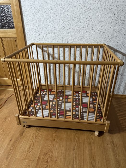 Kojec drewniany dla dziecka