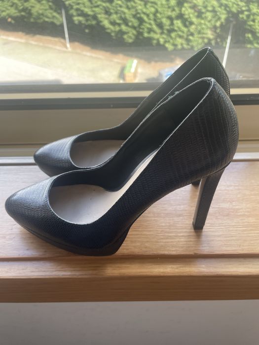 Sapatos de salto alto