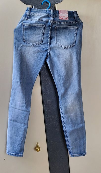Jeansy MONDAY Premium dziury ,cyrkonie