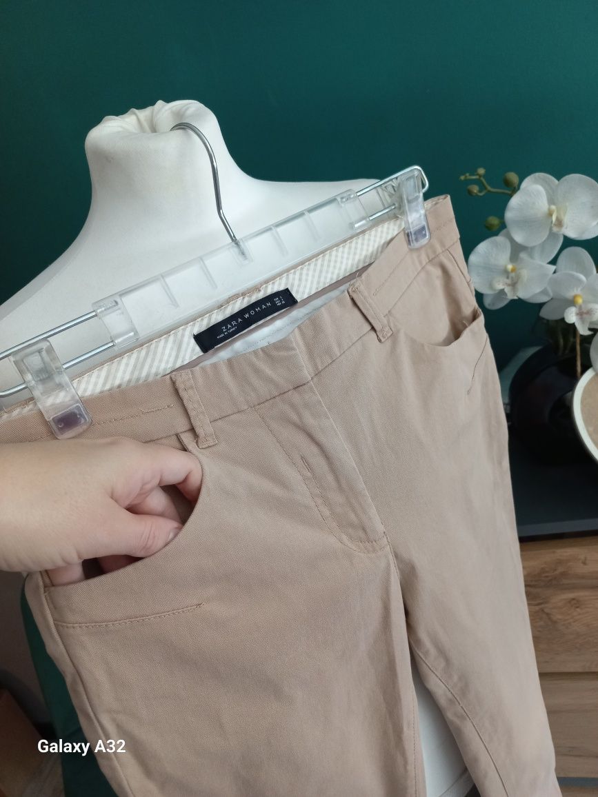Eleganckie spodnie beżowe Zara. M