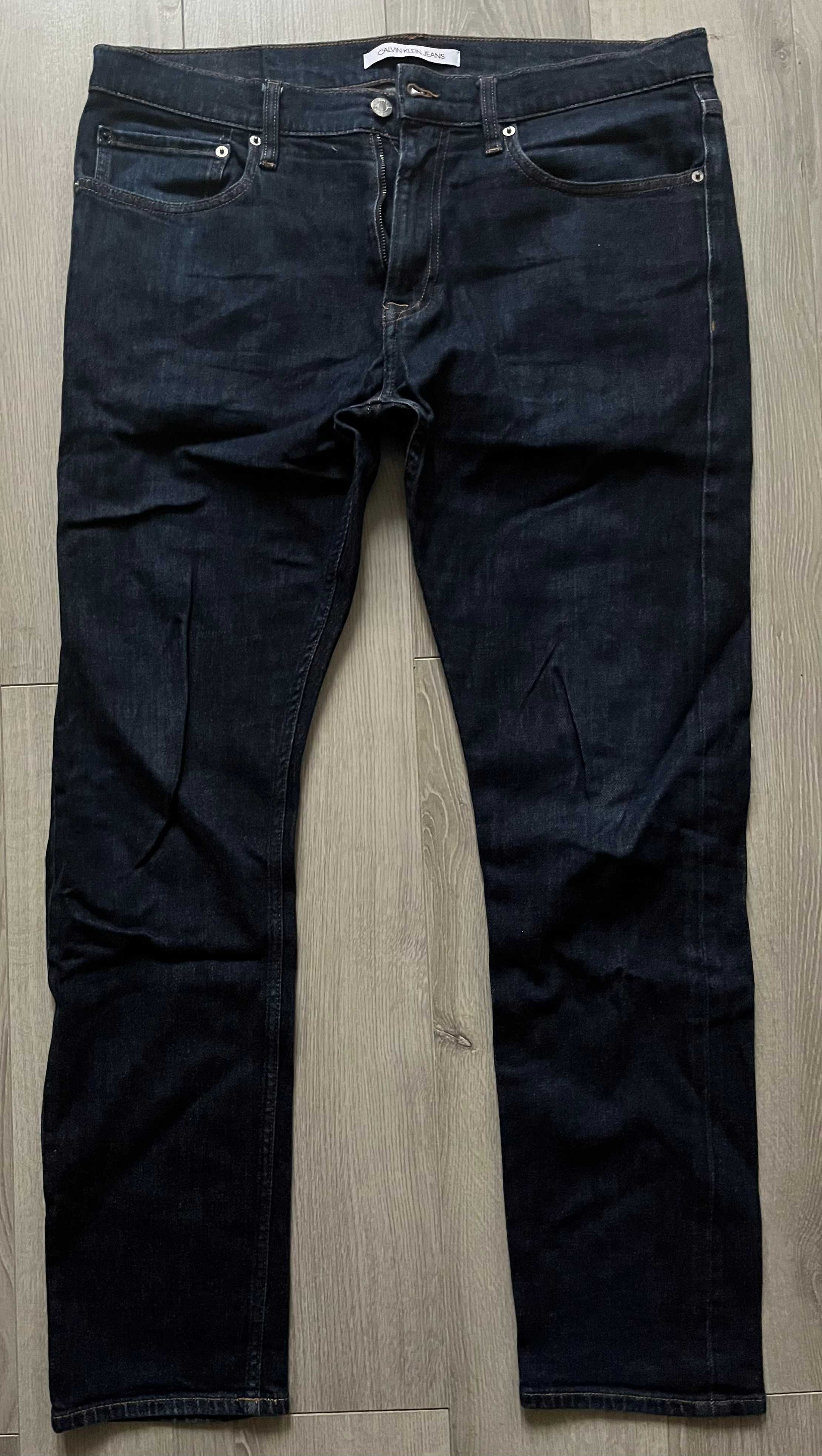 Granatowe jeansy Calvin Klein rozmiar 34/34 98% bawełna