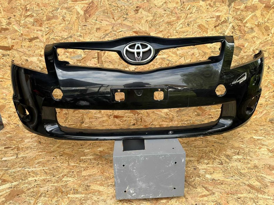 Toyota Auris 1 I lift 09-12 zderzak przedni przód cały orginał