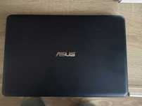 laptop -notebook ASUS E200H  12" z małym defektem