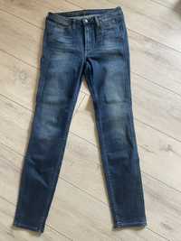 Spodnie Calvin Klein roz 30/32