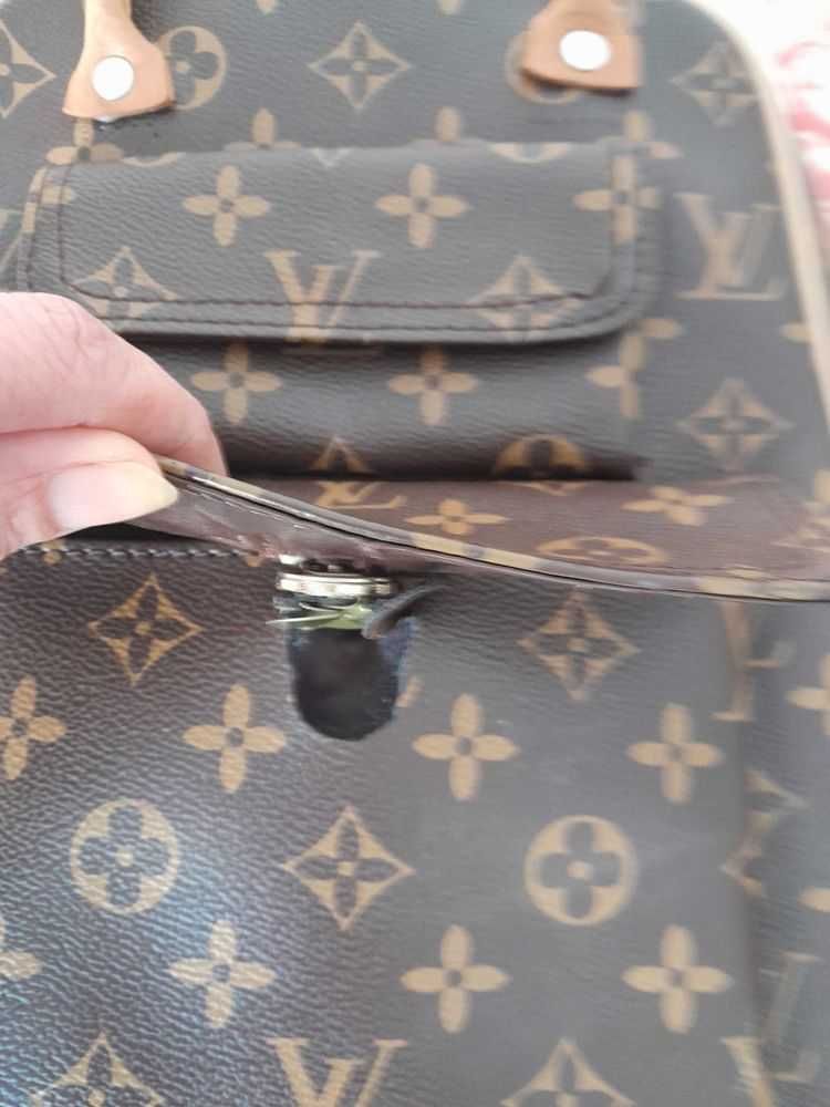 Mala tipo louis vuitton