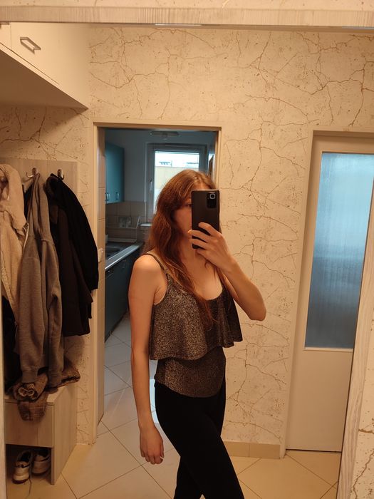 Błyszczące damskie body