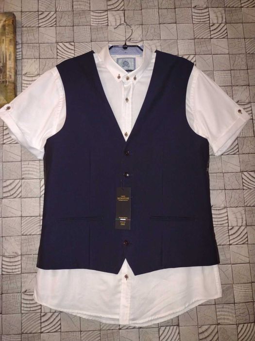 Новий Фірмовий костюмний жилет 100% італійська шерсть р. 42R синій