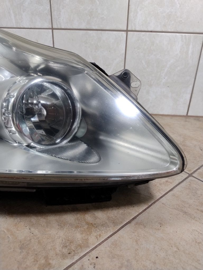 Lampa reflektor prawy przód Opel Corsa D  europa Tyc wysyłka