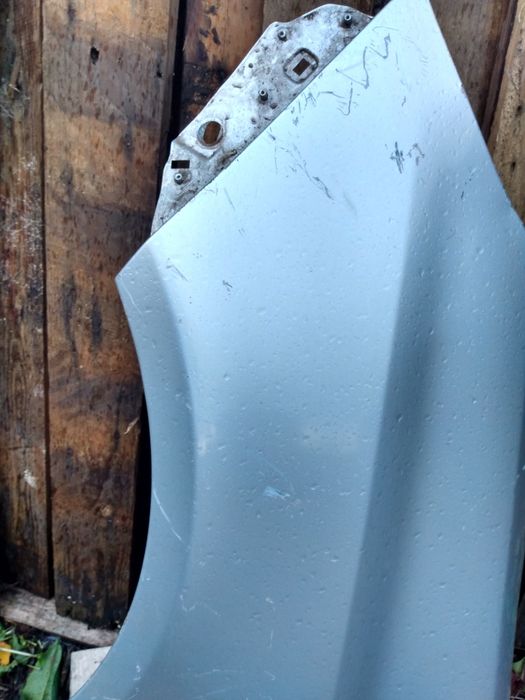 Błotnik przedni lewy Corsa D