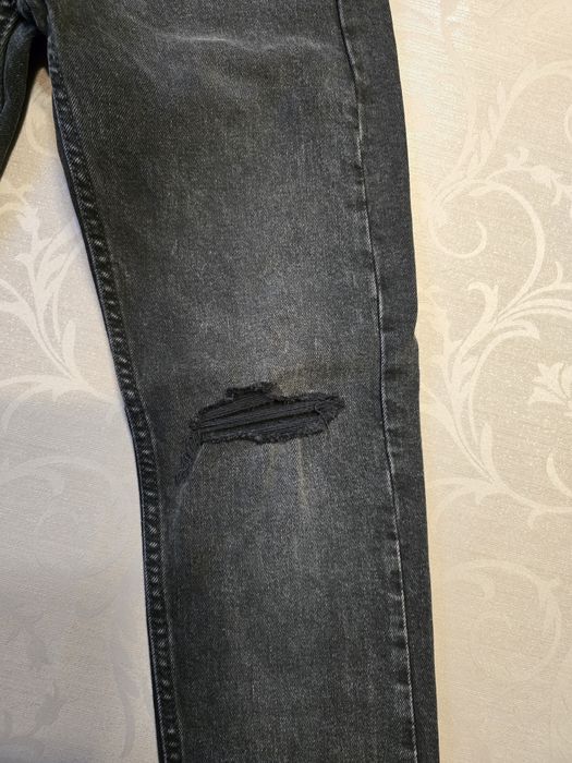 Nowe spodnie Levisy 519 unisex W29 czarne