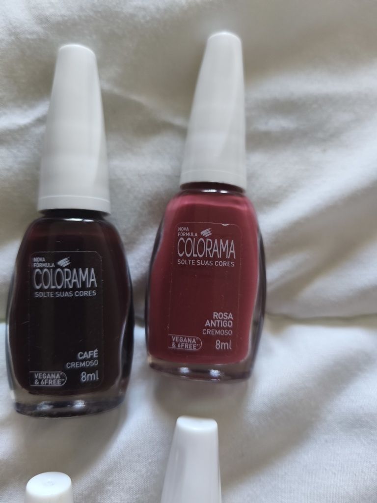 Vernizes da colorama e alicates de aço inoxidável ponta longa.