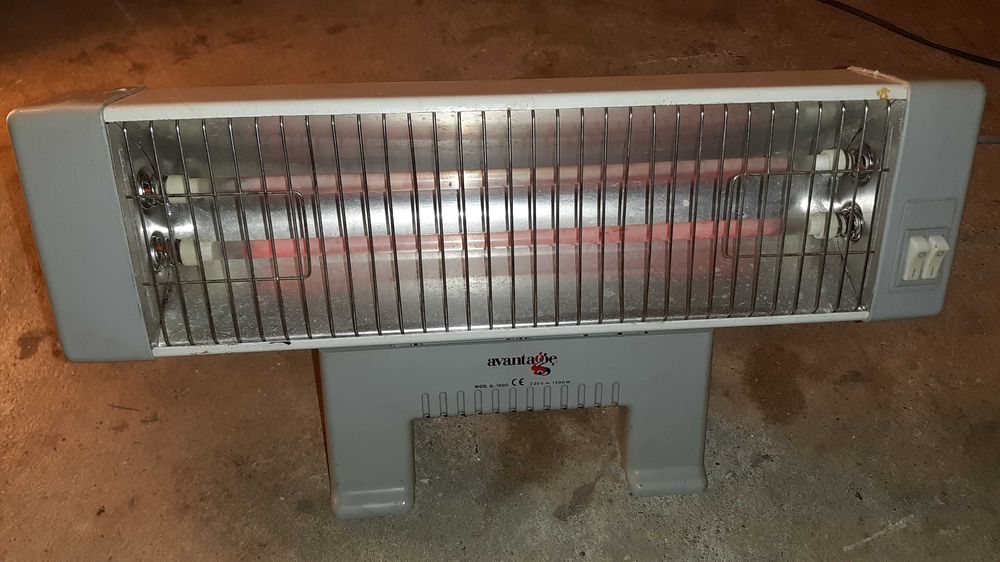 Aquecedor de barras antigo, mas a funcionar bem