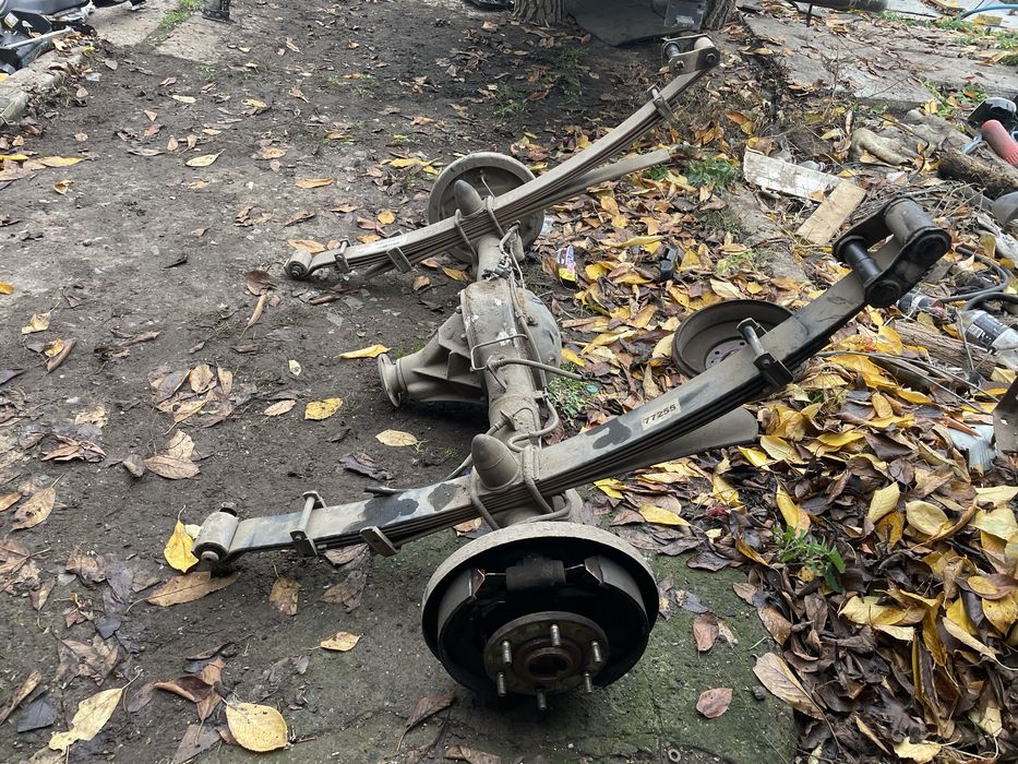 Задній міст-редуктор L200. Ресори задні L200