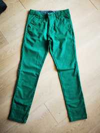 Spodnie chłopięce zielone Reserved r. 152
