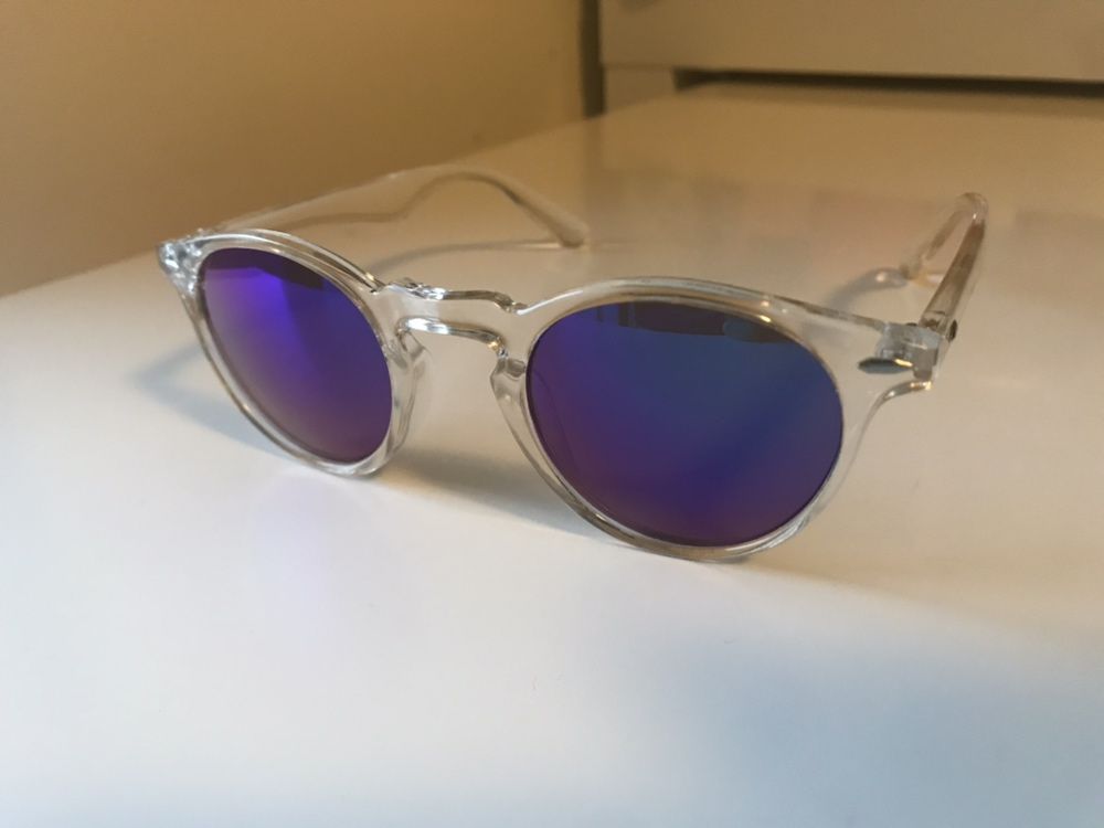 Óculos de Sol armarção transparente