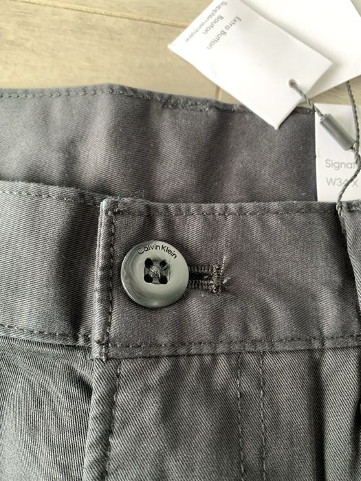 Spodnie meskie Calvin Klein chinosy 34W 30 L