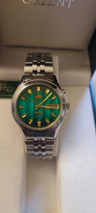 piekny zielony ORIENT automat w stali - caly zestaw