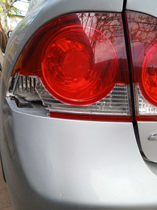 Оригинальный задний фонарь на Honda Civic 4D 8 (06-11)