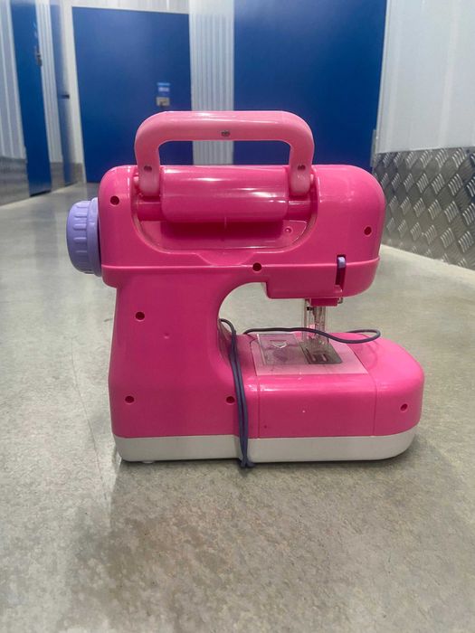 Maquina de costura de criança