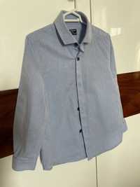 Koszula błękitna niebieska elegancka dla chłopcarozm.104-110 elegancka