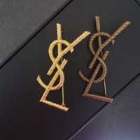 Broszka ysl Yves Saint Laurent złoty kolor 7cm