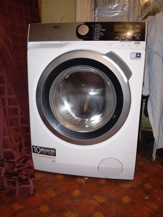 Продам стиральную машину премиум класса AEG L7FEE48S на 8 кг