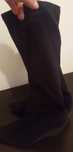 Botas pretas cano alto