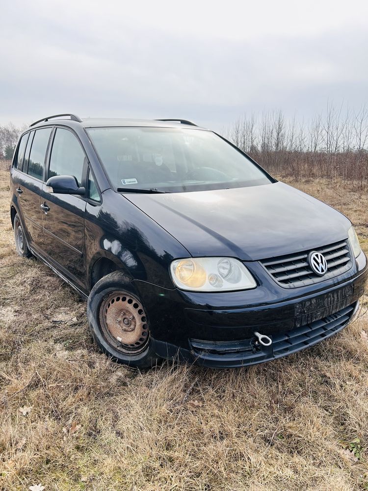 Części Volkswagen Touran/lampy/maska/drzwi/rozrusznik/turbo/zderzak