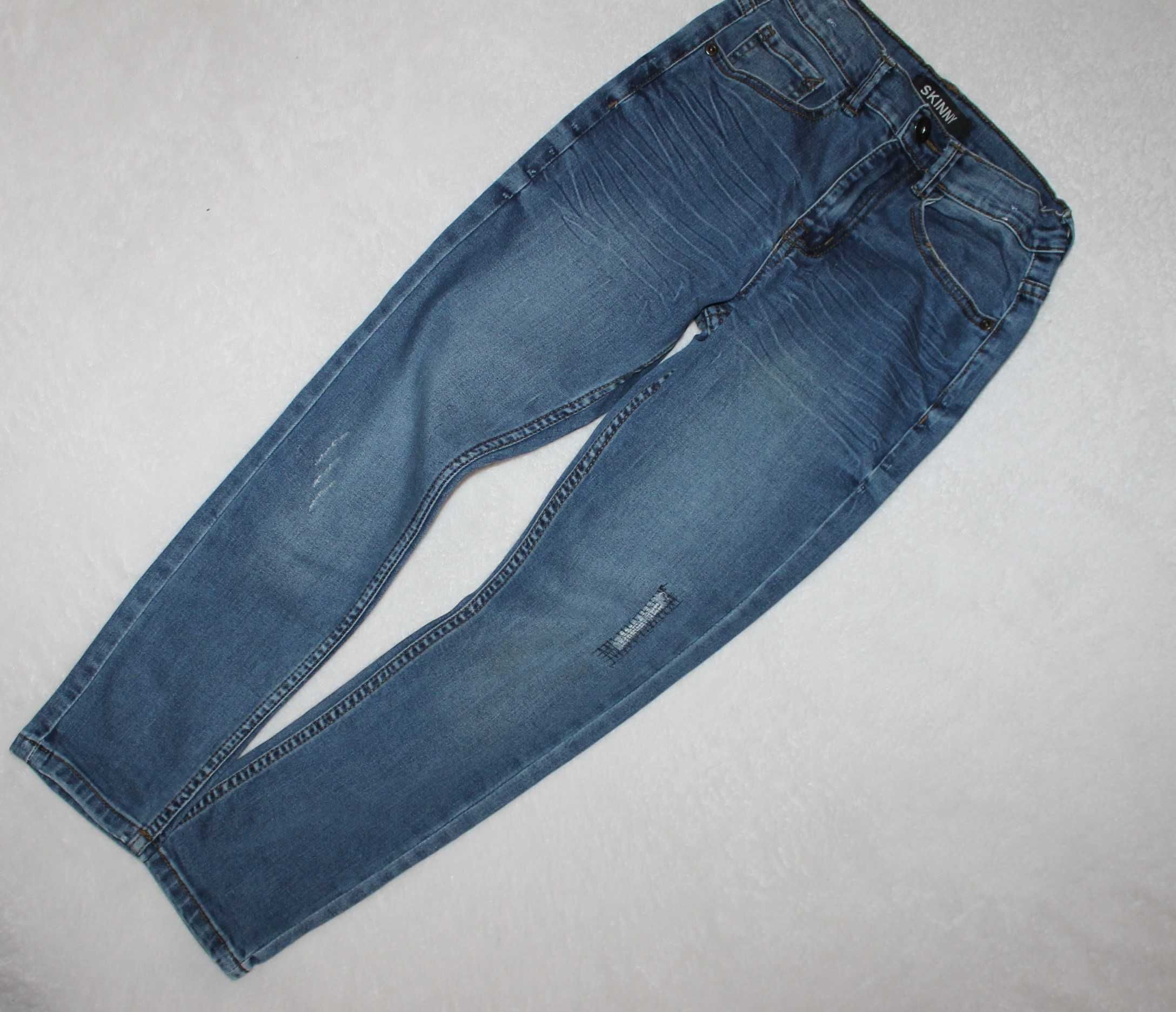 Skinny spodnie jeans r.134 niebieskie