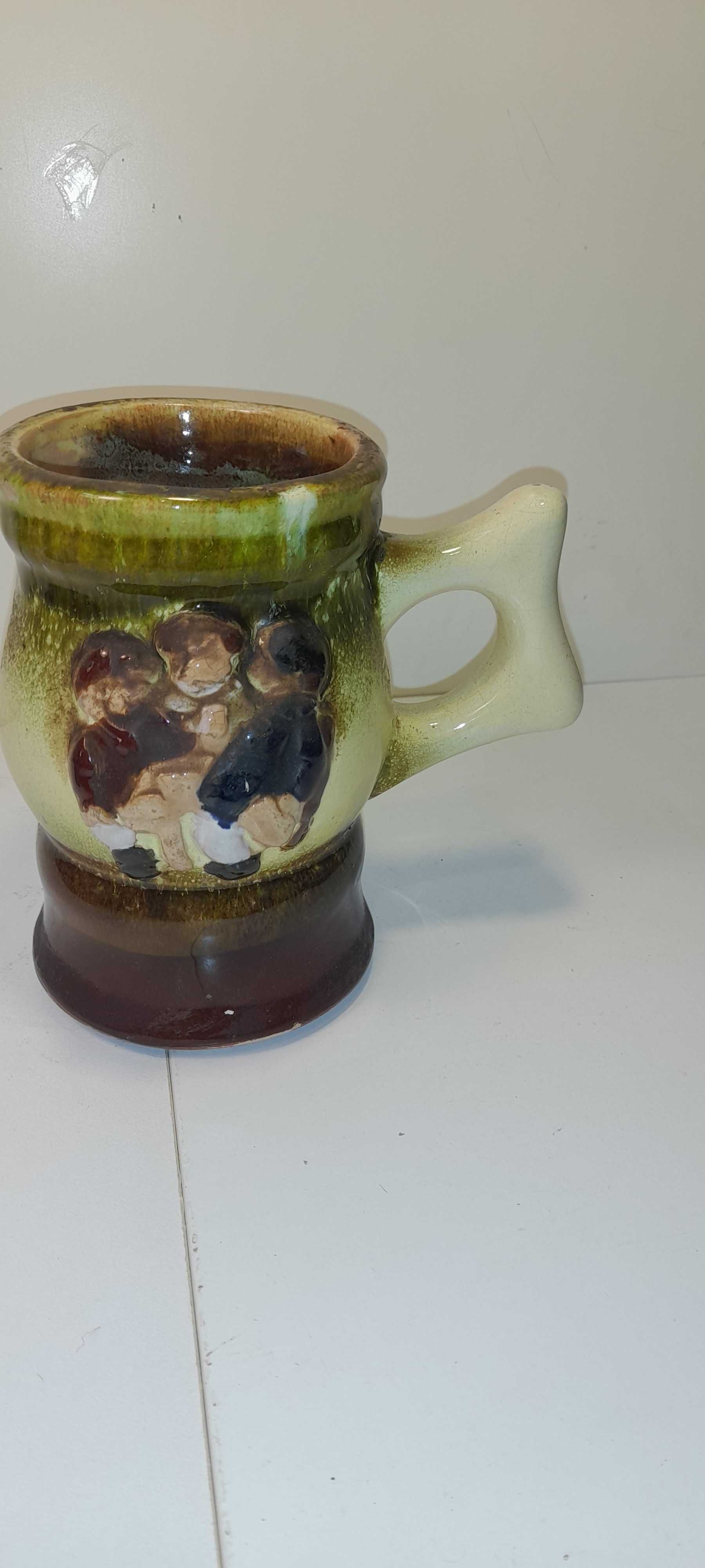 Stary kufel ceramiczny .