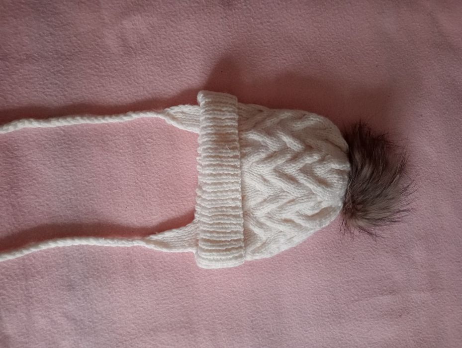 Продам шапку зимову, очень теплая.