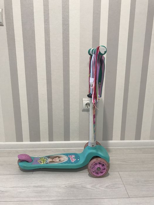 Самокат для дівчинки 3-5 років