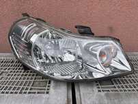 Lampa przednia SUZUKI SX4 FIAT SEDICI PRAWA EUROPA ORYGINALNA KOITO
