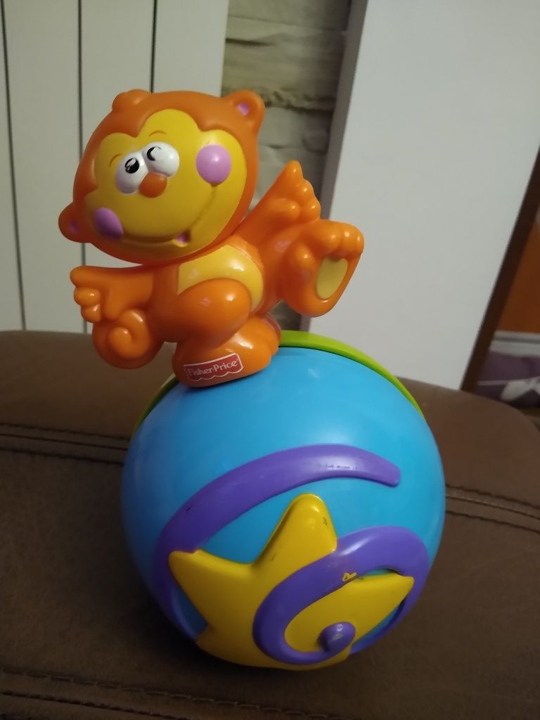 Małpka na kuli interaktywna Fisher Price śmieje się, buja na kuli,