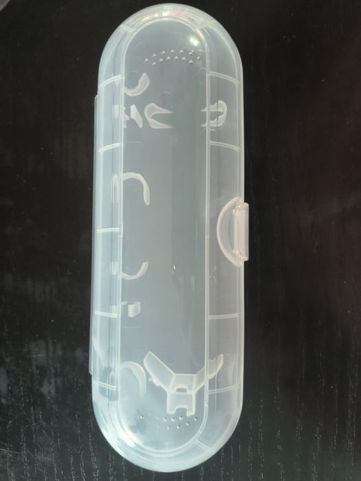 Caixa de viagem para escova de dentes.