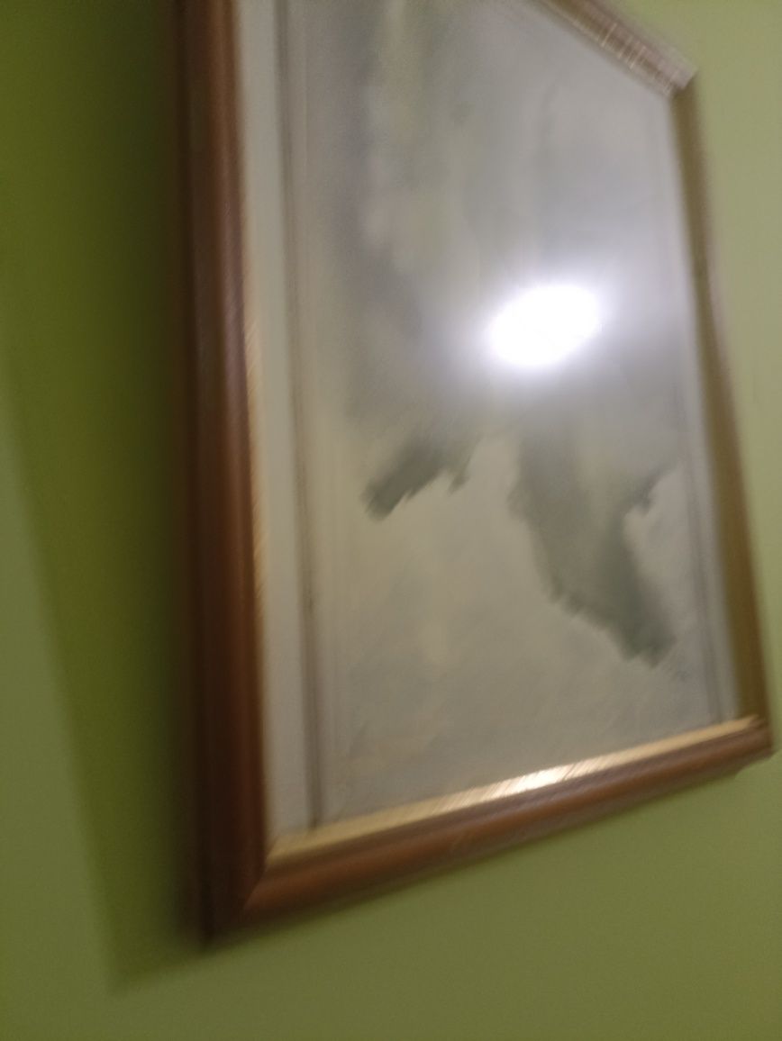Stary obraz akwarela w drewnianej złoconej ramie za szkłem.