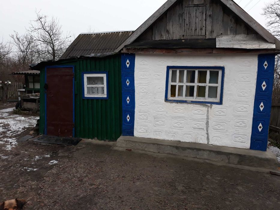 Продам 1/2 будинку