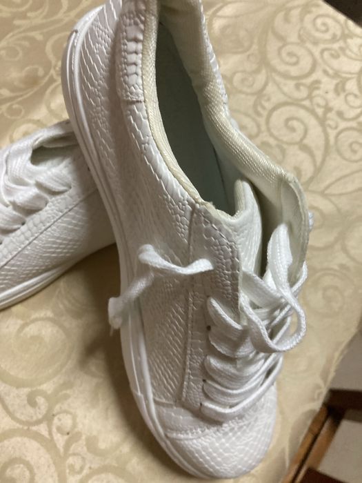 Sapatilhas Novas