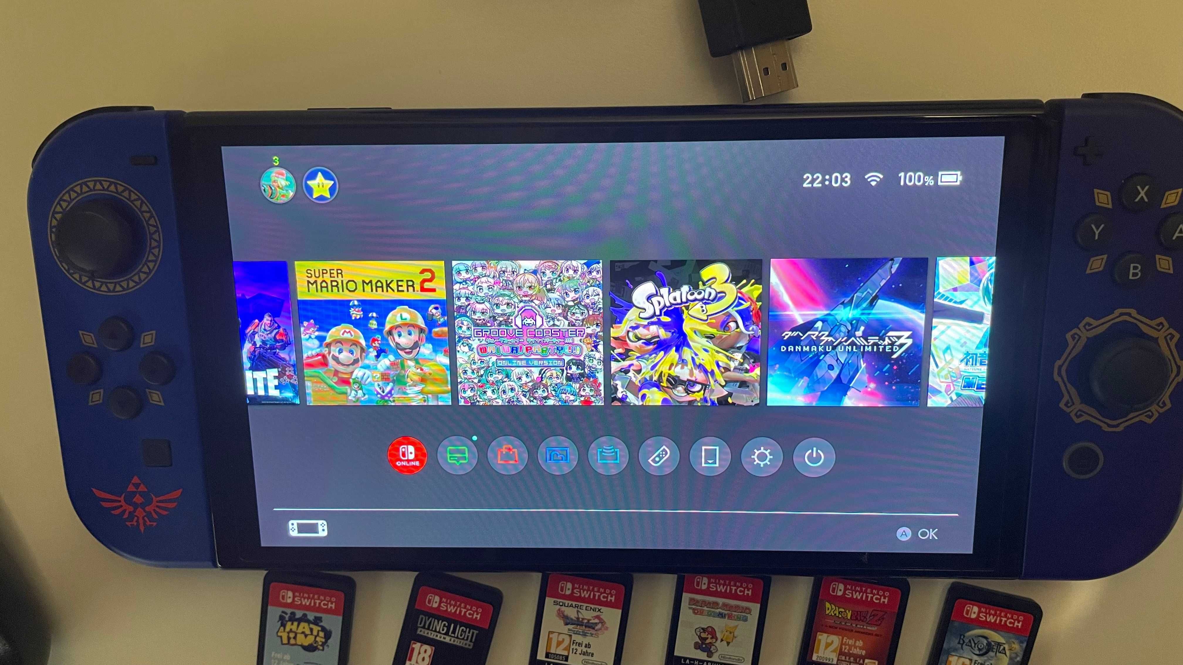 Nintendo Switch Oled + Joycons Zelda + Pro controller + 17 jogos
