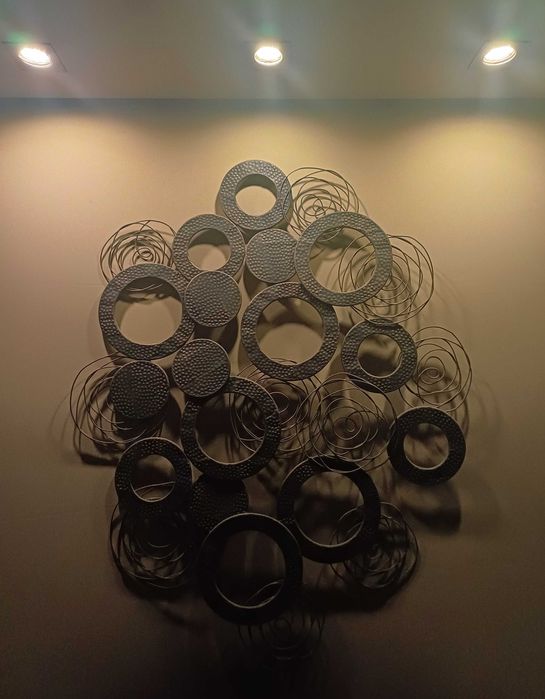 Peça decorativa metálica
