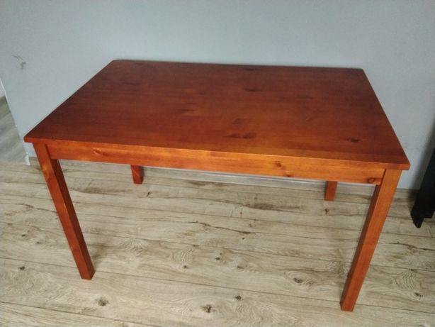 Stół drewniany brązowy .