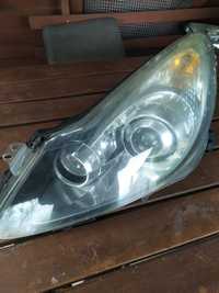 Opel Corsa D lampa lewa soczewka