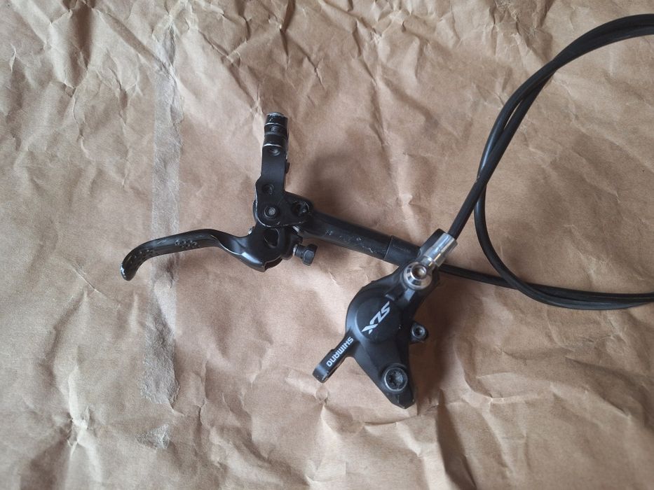 Hamulec shimano m7000 przód lewy